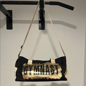 Justice Gold and Black Gymnast Bag